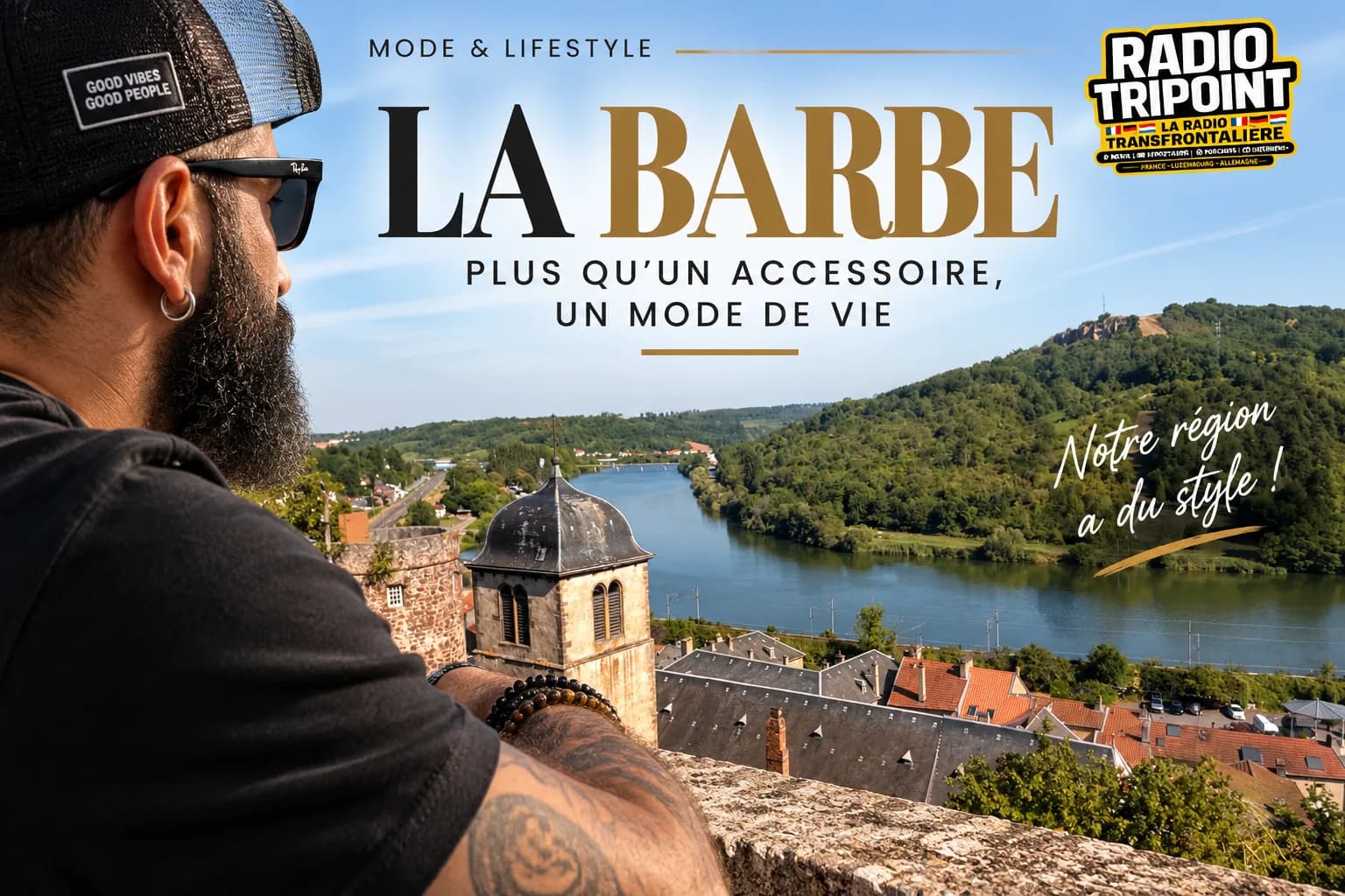 Visuel « La barbe, plus qu'un accessoire, un mode de vie » : un homme barbu à casquette et lunettes de soleil regarde une vallée traversée par une rivière.